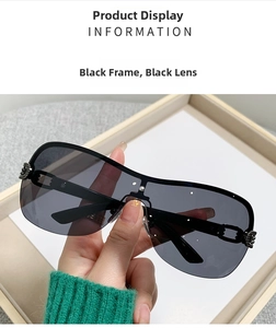 Detail of square semi-rimless sunglasses with gold chain decoration on the black temple
