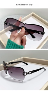 Detail of Y2K square semi-rimless sunglasses with gradient gray lens and chain temple
