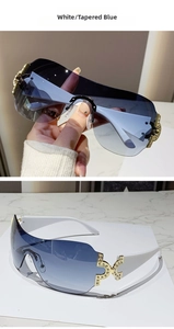 Detail of rimless Y2K sunglasses with gradient blue lenses and gold rhinestone hinges