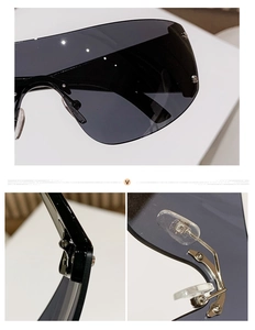 Detail view of Y2K rimless sunglasses featuring metal nose pads and thick black temples