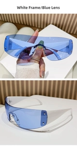 Detail of white-framed Y2K sports sunglasses with blue lenses and star stud accents