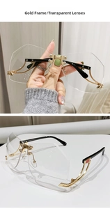 Detail of rimless polygon glasses with gold metal bridge and transparent lenses