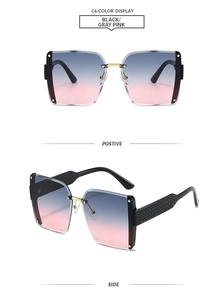 Detail of square rimless sunglasses with gradient lenses and textured black side temples