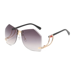 Chic rimless Y2K sunglasses with gradient purple geometric lenses and gold metal temples