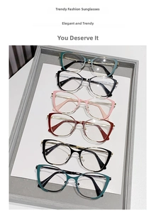 Detailed view of cat-eye glasses frames in multiple colors on a display tray