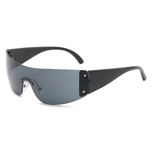 Frameless Y2K wrap around sunglasses with star rivets and grey lenses on white background