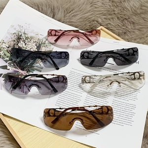 Chic Y2K rimless wrap-around metal sunglasses in various colors for street fashion