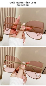 Detail of pink gradient lenses with gold metal frames and elegant pearl temple tips