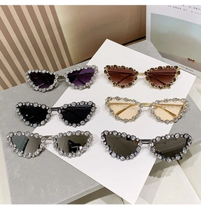 Luxurious cat eye sunglasses set with six different colors and sparkling rhinestones