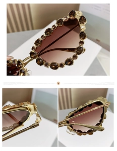 Macro detail of luxury cat-eye sunglasses with rhinestone-encrusted gold metal frames