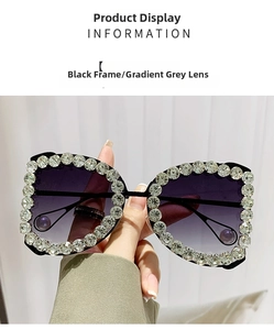 Detailed close-up of luxurious black oversized sunglasses with crystal-embossed frames
