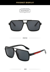 Detail of square pilot sunglasses featuring classic double bridge and red temple accent