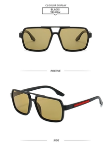 Detail view of square pilot sunglasses with black frame, yellow lenses and red stripe