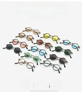 Flat lay of retro round metal sunglasses in various lens colors for diverse fashion looks