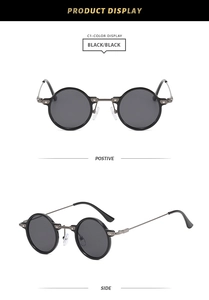 Detail of retro round metal sunglasses featuring black lenses and steampunk frame