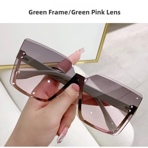 Detail of rimless square sunglasses with gradient green-pink lenses and gold rivets