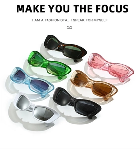 Flat lay of colorful cat eye sunglasses with glitter frames in seven trendy colors