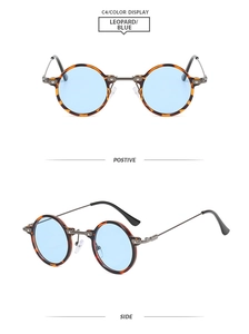 Macro side view of retro round leopard print sunglasses with light blue lenses