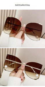 Detailed view of D-frame sunglasses with gold metal rims and elegant pearl temple tips