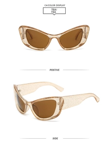 Detail view of cat eye sunglasses with glitter gold frames and tea lenses