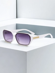 Close-up of white frame sunglasses with purple gradient lenses and gold temple hinge details