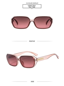 Detail view of light tea pink square sunglasses with gold pattern and gradient lenses