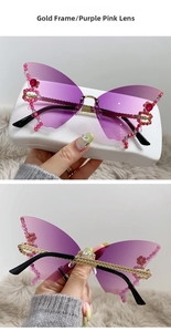 Close-up of gold frame butterfly rimless sunglasses with purple pink gradient lenses