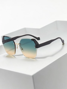 Detail of blue-yellow gradient rimless sunglasses with textured black temples and gold accents