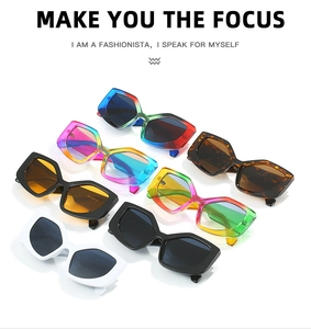 Collection of polygon rainbow oversized sunglasses in various colors on white background