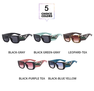 Detail view of five square fashion sunglasses with vintage plaid patterns on the temples