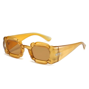 Occhiali da sole squadrati ambra con montatura a onde floreali in stile Y2K trendy