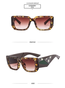 Detail view of square leopard print sunglasses with gradient tea lenses and geometric temples