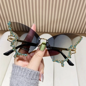 Fashion butterfly rimless sunglasses with gradient lenses and blue rhinestone details