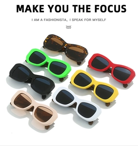 Detailed row of stylish wide-frame rectangle sunglasses in various candy colors