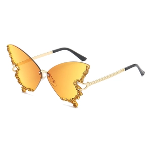 Fashion butterfly shaped rimless sunglasses with orange lenses and sparkling crystals