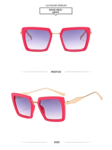 Detail of rose red square sunglasses with gold metal temples and purple gradient lenses