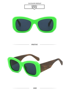 Detail of neon green square frame sunglasses with thick tortoiseshell textured temples
