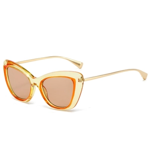 Vintage cat-eye sunglasses with orange gradient frame and elegant gold metal temples