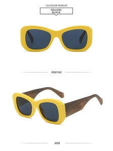 Close-up of chunky yellow rectangular sunglasses with leopard print temples and black lens