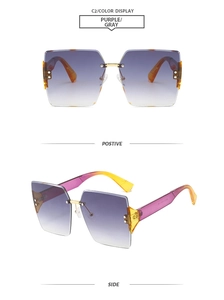 Detail view of square rimless sunglasses with purple gradient lenses and metal accents