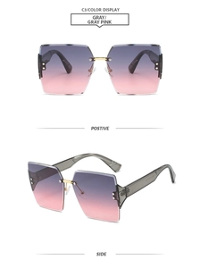 Detail of square rimless sunglasses with pink gradient lenses and gold metal bridge