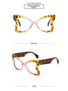 Macro detail of butterfly shaped glasses with leopard print and pink gradient finish