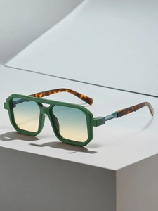 Detail of square pilot sunglasses with gradient lenses and tortoise temples