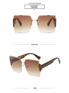 Detail of square rimless sunglasses with brown gradient lenses and leopard print temples