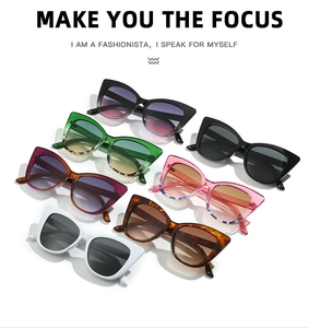 Collection of retro cat-eye sunglasses in various colors on a white background