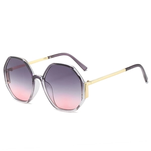 Modern hexagonal sunglasses with purple gradient lenses and slim gold metal frame