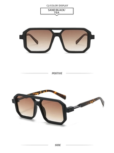 Detail view of square aviator sunglasses with sand black frames and tea gradient lenses
