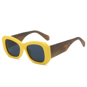 Fashionable square frame sunglasses with yellow front and brown tortoiseshell thick temples
