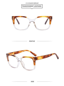 Close-up of square frames in transparent leopard pattern with silver metal rivets