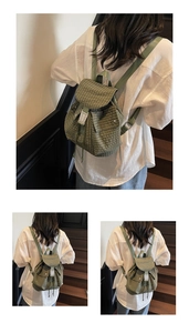 Detail of green plaid backpack featuring a buckle closure and vintage casual design